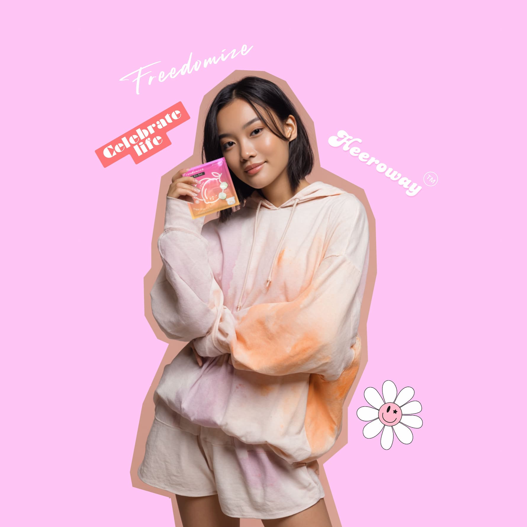 woman in pastel hoodie holding freedomize peach sugar free icy mints packaging with pink background and celebrate life text graphics