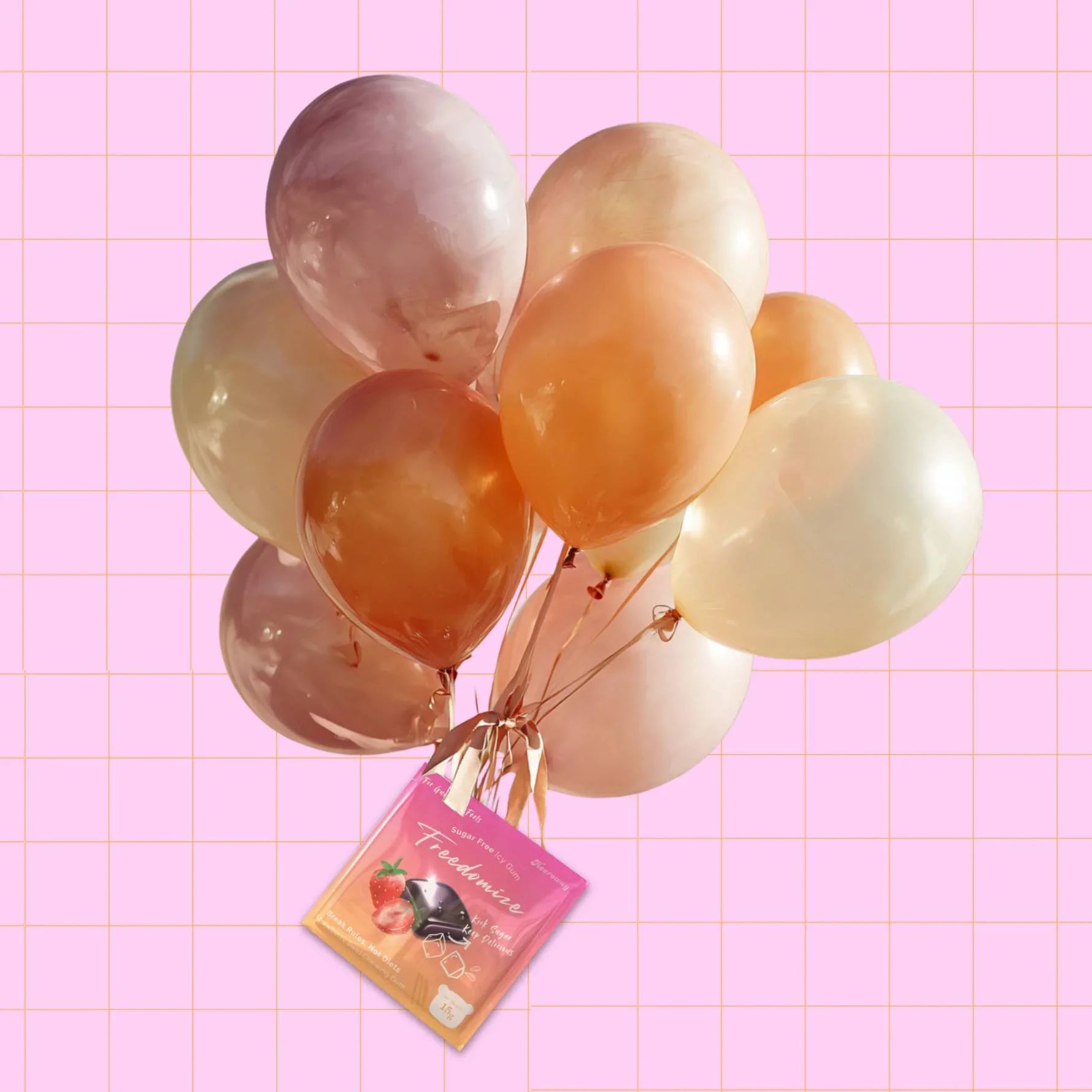 A bunch of pastel balloons tied together with a Freedomize Strawberry Swirl Sugar Free Icy Gum pouch against a pink grid background.