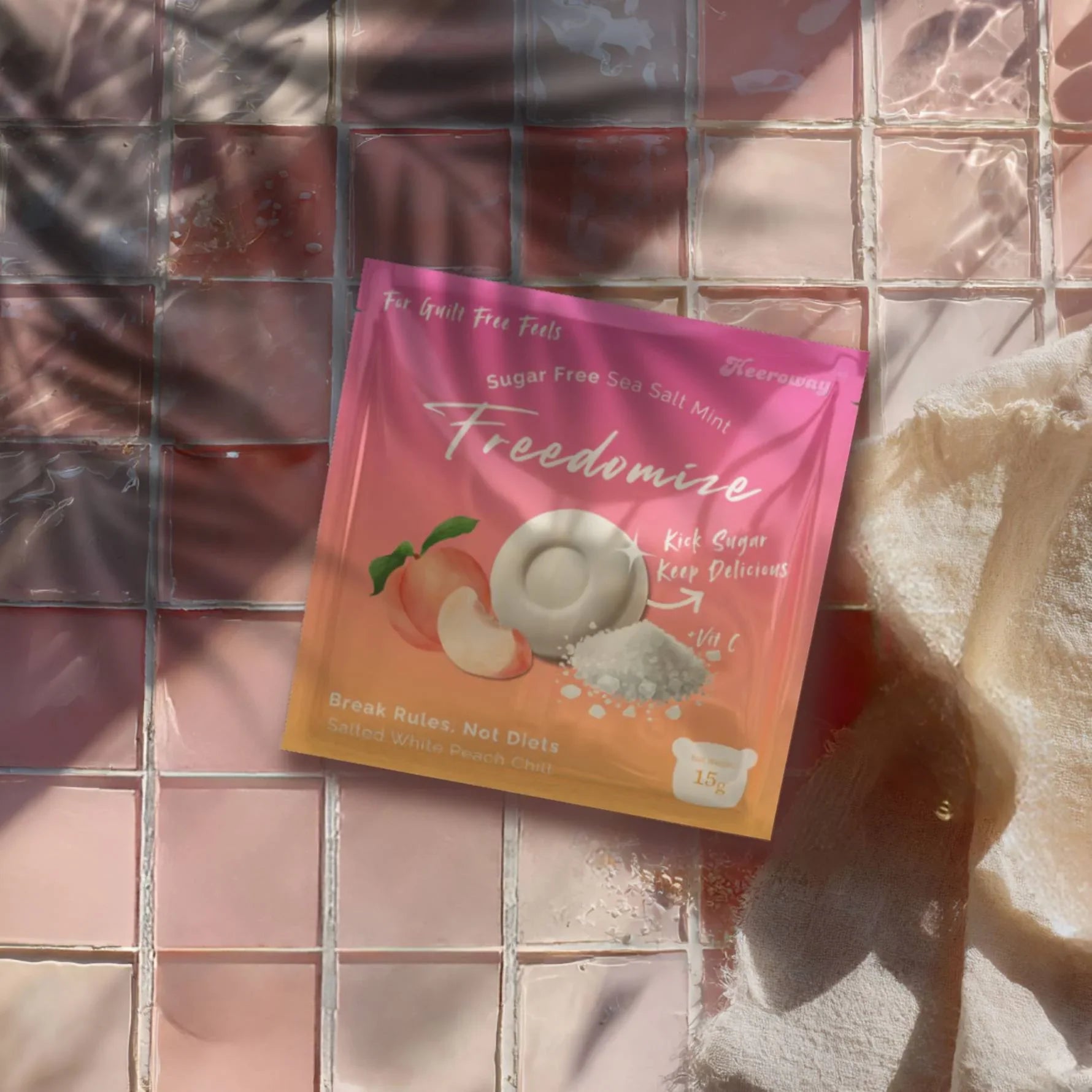 Freedomize sugar-free sea salt mint in Salted white  peach chill flavor, front and back packaging shown on a pink background.