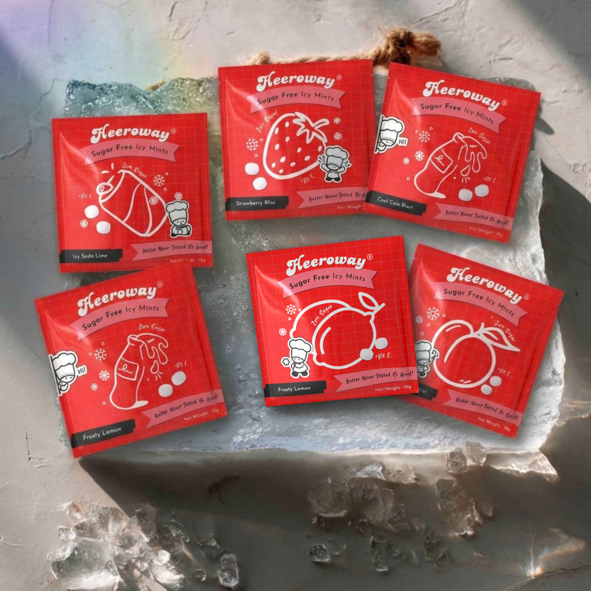 heeroway sugar free icy mints in assorted flavors displayed on ice with a pink border.